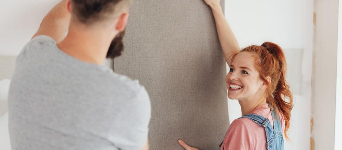 Couple choosing wallpaper