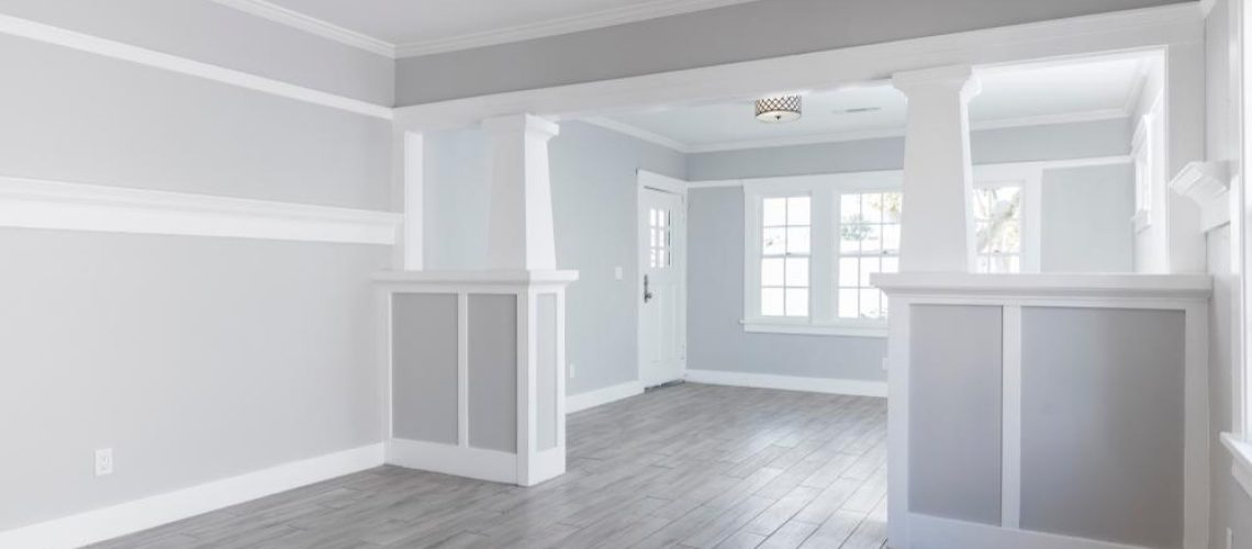 living room interior after remodelling with fire place and grey